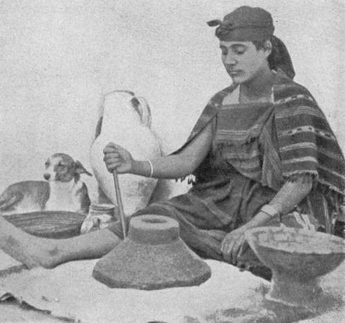 Рис. 68. Арабская девушка за ручной мельницей